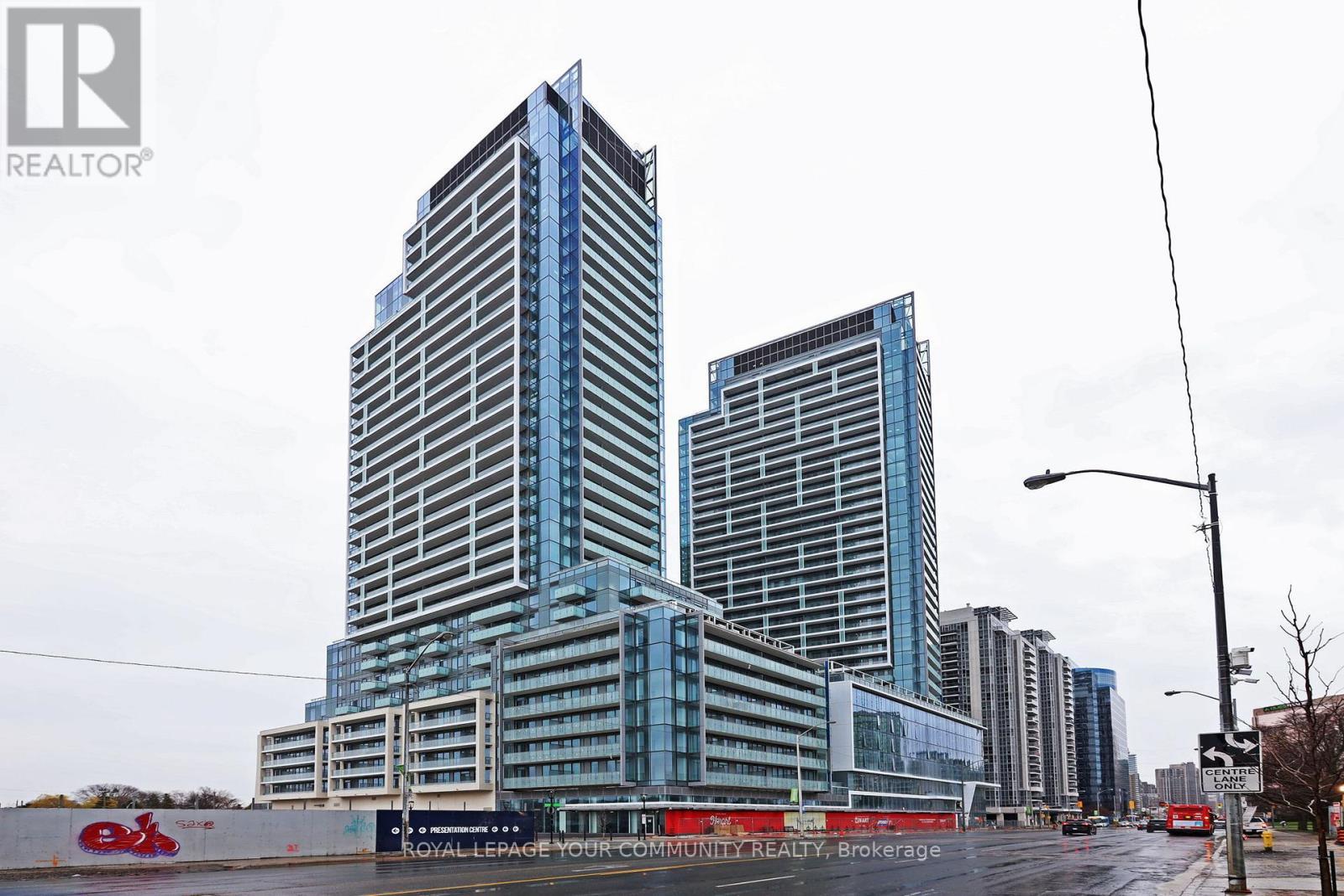1003 - 8 Olympic Garden Drive, Toronto, ON - Outdoor With Facade