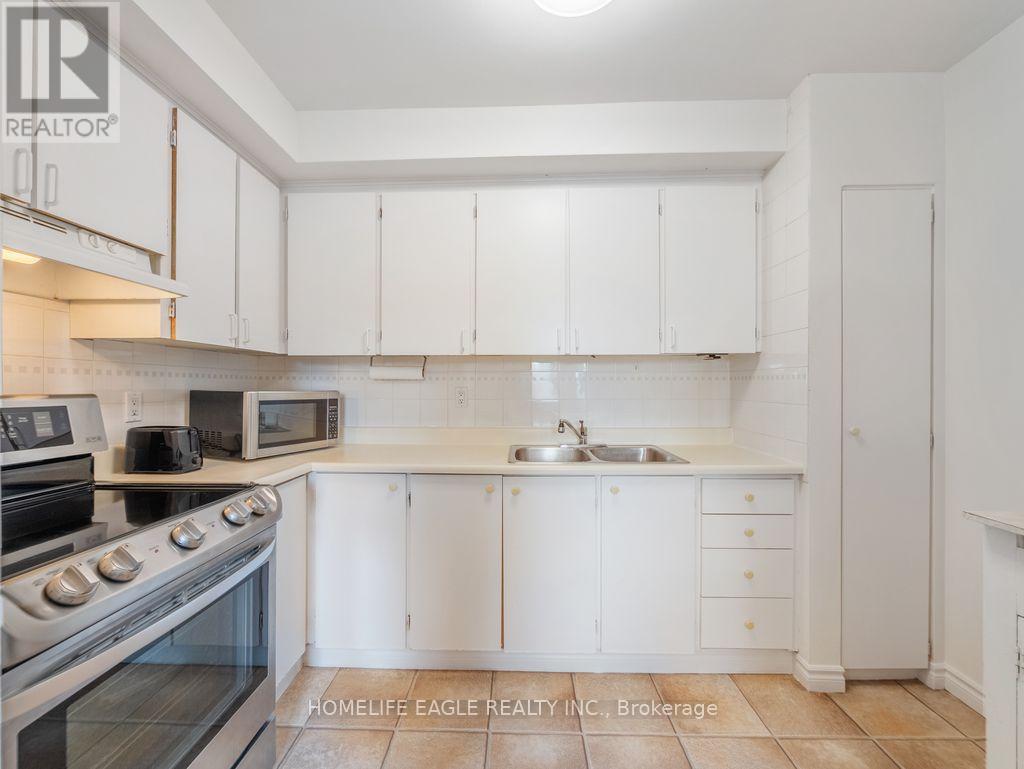 16 - 7255 Dooley Drive, Mississauga, ON - Indoor Photo Showing Kitchen With Double Sink