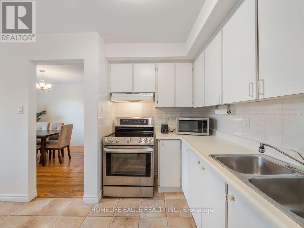 16 - 7255 Dooley Drive, Mississauga, ON - Indoor Photo Showing Kitchen With Double Sink