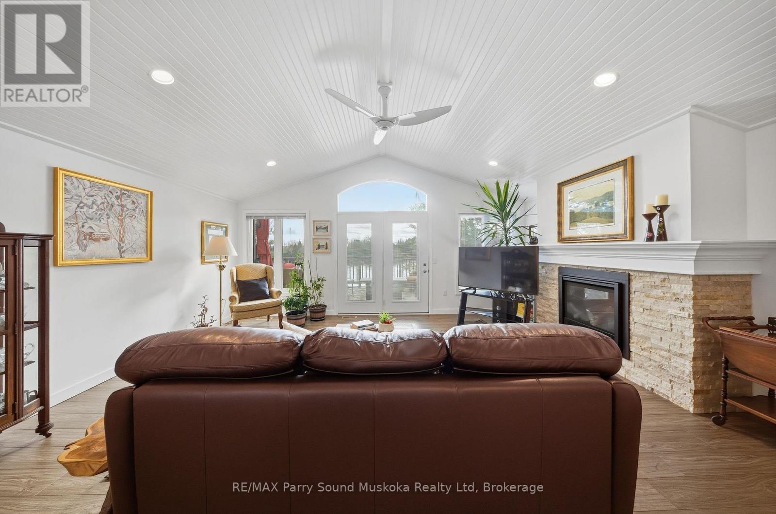 215 Dunchurch Estates Road, Whitestone (Hagerman), ON - Indoor Photo Showing Living Room With Fireplace