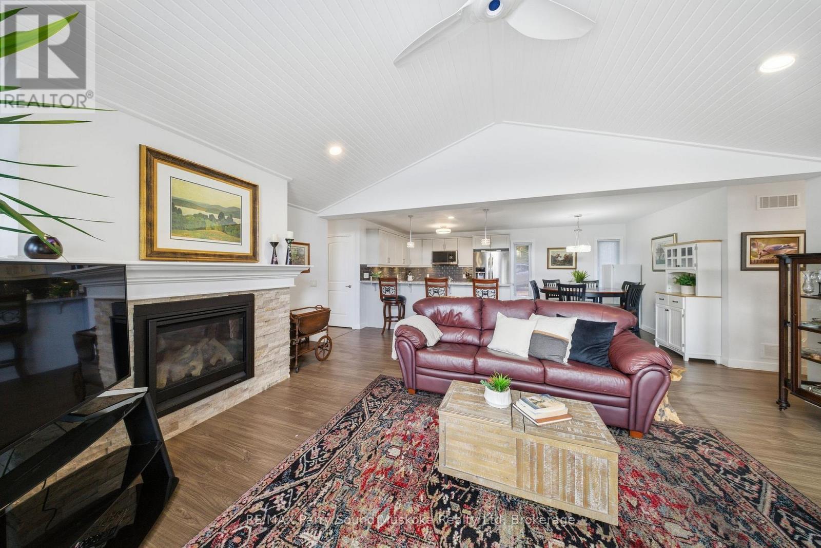 215 Dunchurch Estates Road, Whitestone (Hagerman), ON - Indoor Photo Showing Living Room With Fireplace