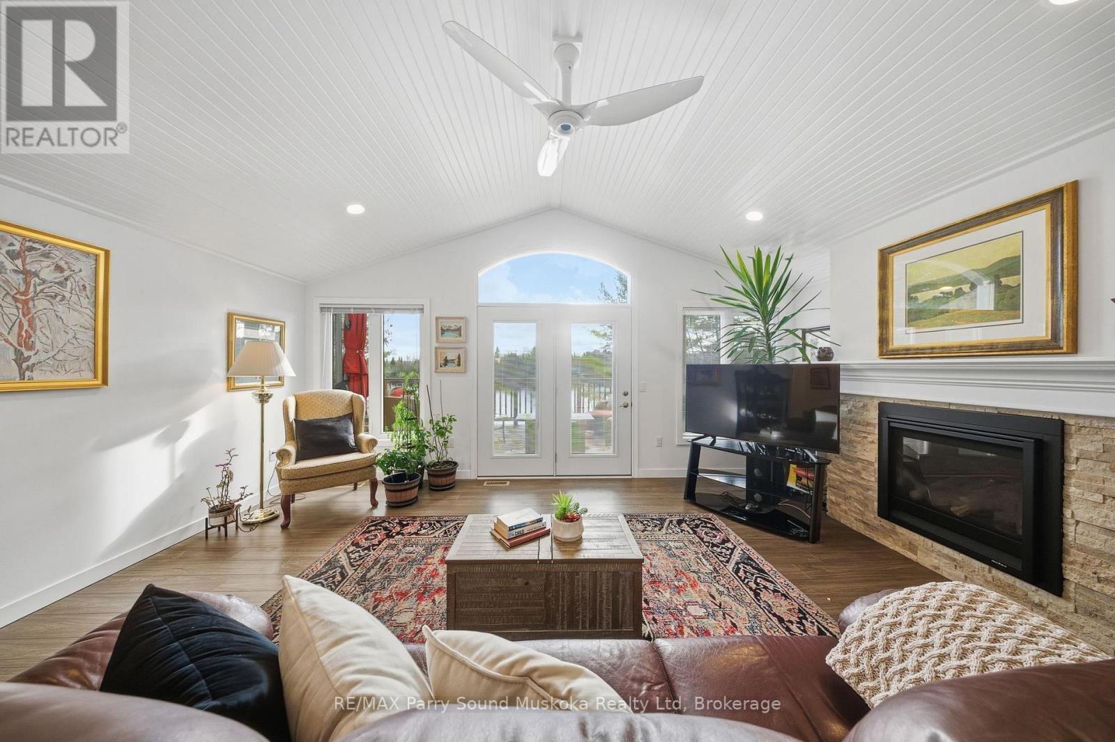 215 Dunchurch Estates Road, Whitestone (Hagerman), ON - Indoor Photo Showing Living Room With Fireplace