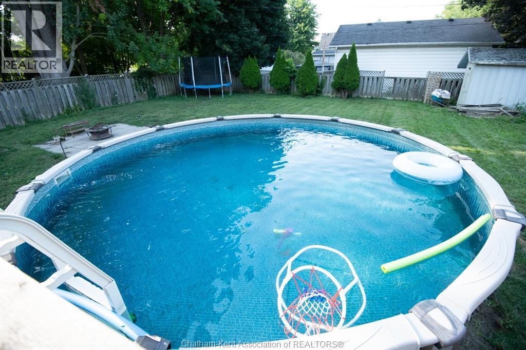 232 Hughes Street, Dresden, ON - Outdoor With Above Ground Pool With Backyard