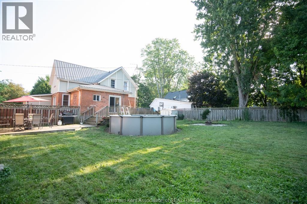 232 Hughes Street, Dresden, ON - Outdoor With Above Ground Pool With Backyard