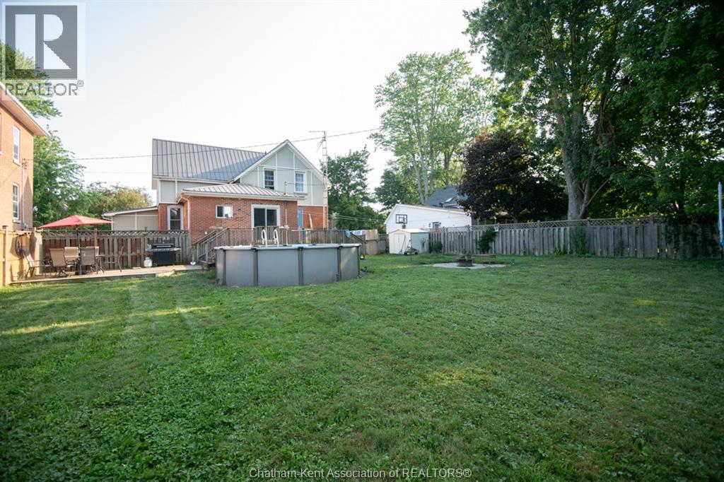 232 Hughes Street, Dresden, ON - Outdoor With Above Ground Pool With Backyard