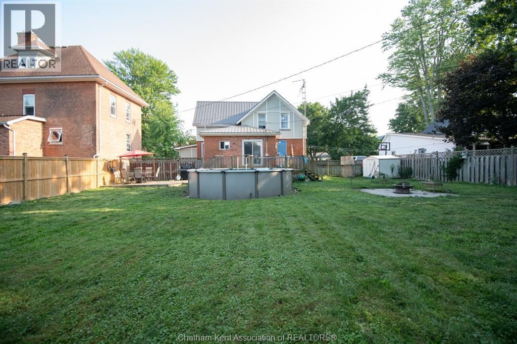232 Hughes Street, Dresden, ON - Outdoor With Above Ground Pool With Backyard