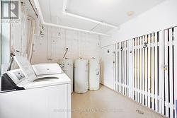 Laundry area, storage and 3 owned HWH -