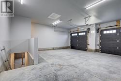 Garage - double openers - stairs to basement -