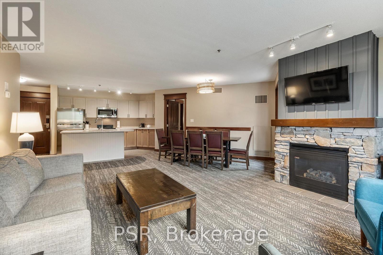 209 - 152 Jozo Weider Boulevard, Blue Mountains, ON - Indoor Photo Showing Living Room With Fireplace
