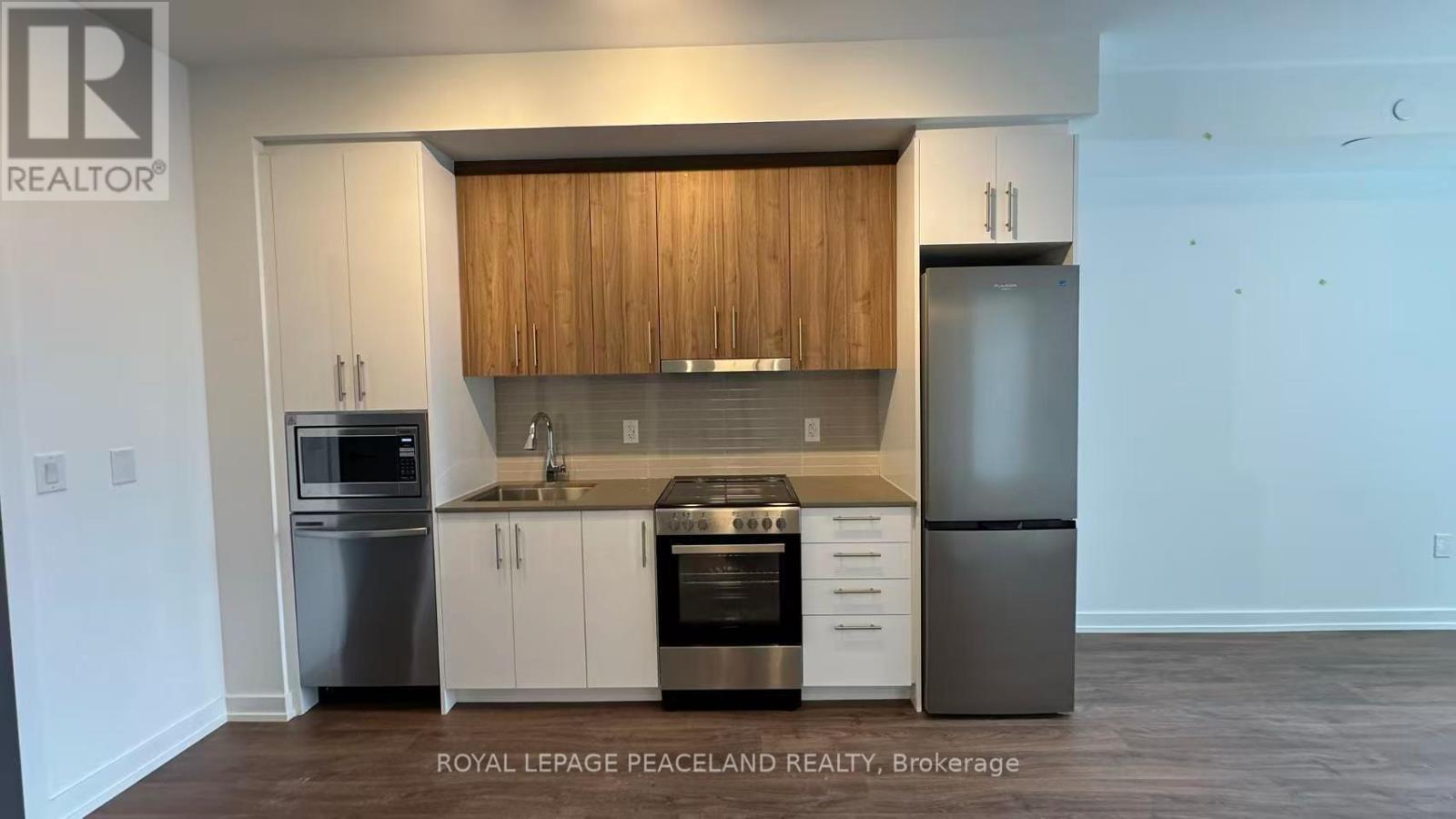 A303 - 9781 Markham Road, Markham, ON - Indoor Photo Showing Kitchen With Stainless Steel Kitchen