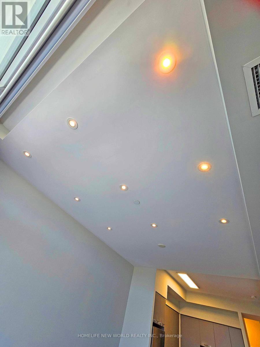 Pot Lights in the Living and Dining Room - 731 - 9471 Yonge Street, Richmond Hill, ON - Indoor Photo Showing Other Room