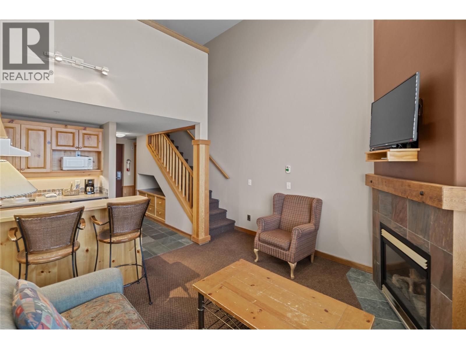 5335 Big White Road Unit# 220, Big White, BC - Indoor Photo Showing Living Room With Fireplace