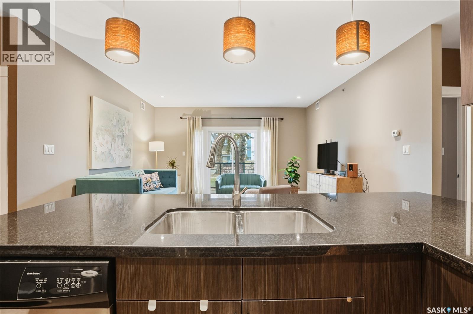 110 721 8Th Street E, Saskatoon, SK - Indoor Photo Showing Kitchen