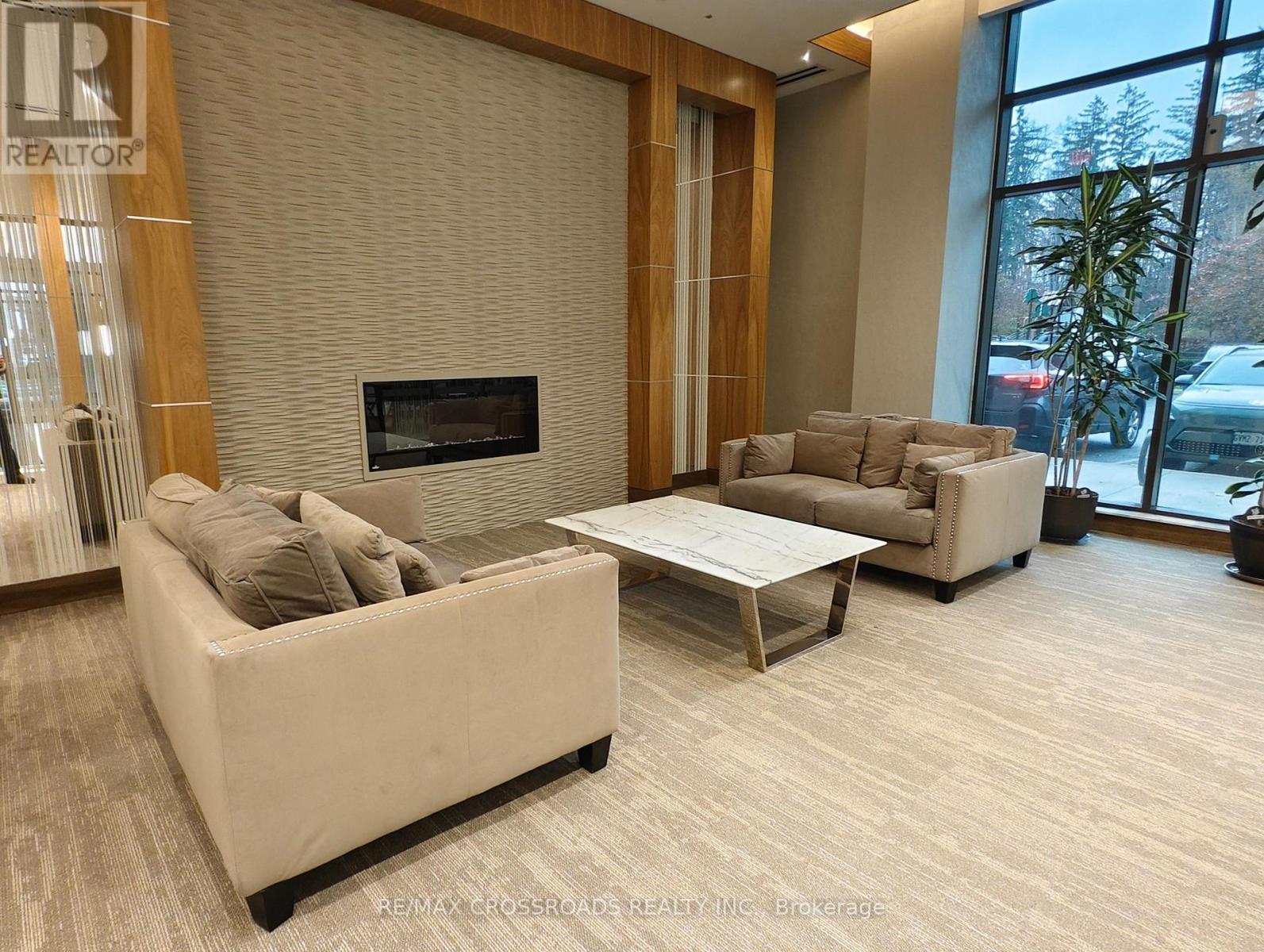 Meeting Room - 218 - 9506 Markham Road, Markham, ON - Indoor Photo Showing Living Room With Fireplace