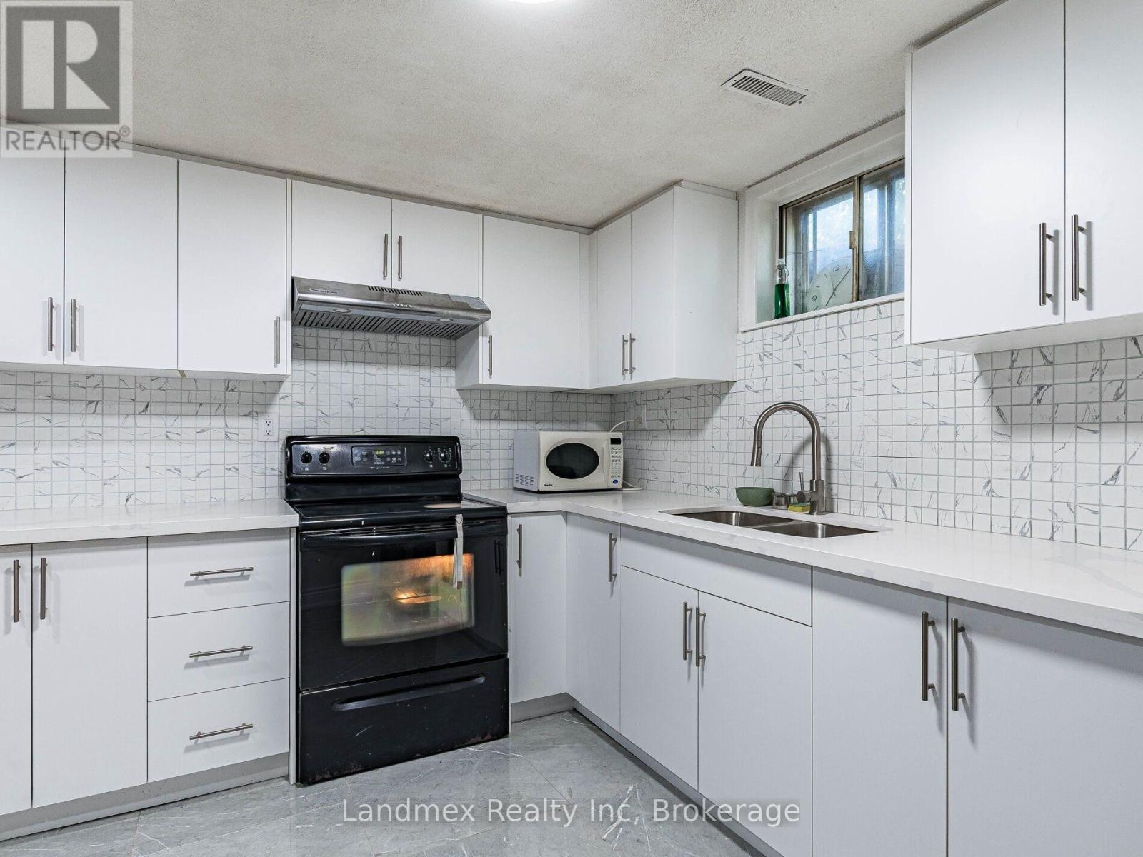 Lower - 7738 Kittridge Drive, Mississauga, ON - Indoor Photo Showing Kitchen With Double Sink