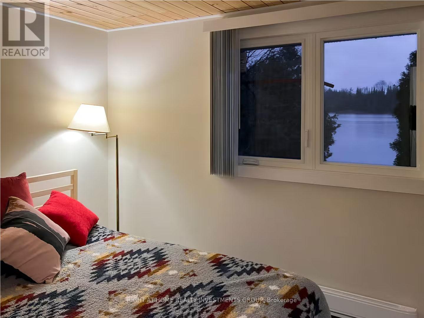 284 Kawartha Hideaway Road, Trent Lakes, ON - Indoor Photo Showing Bedroom