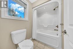 Main Bathroom with Large Window -