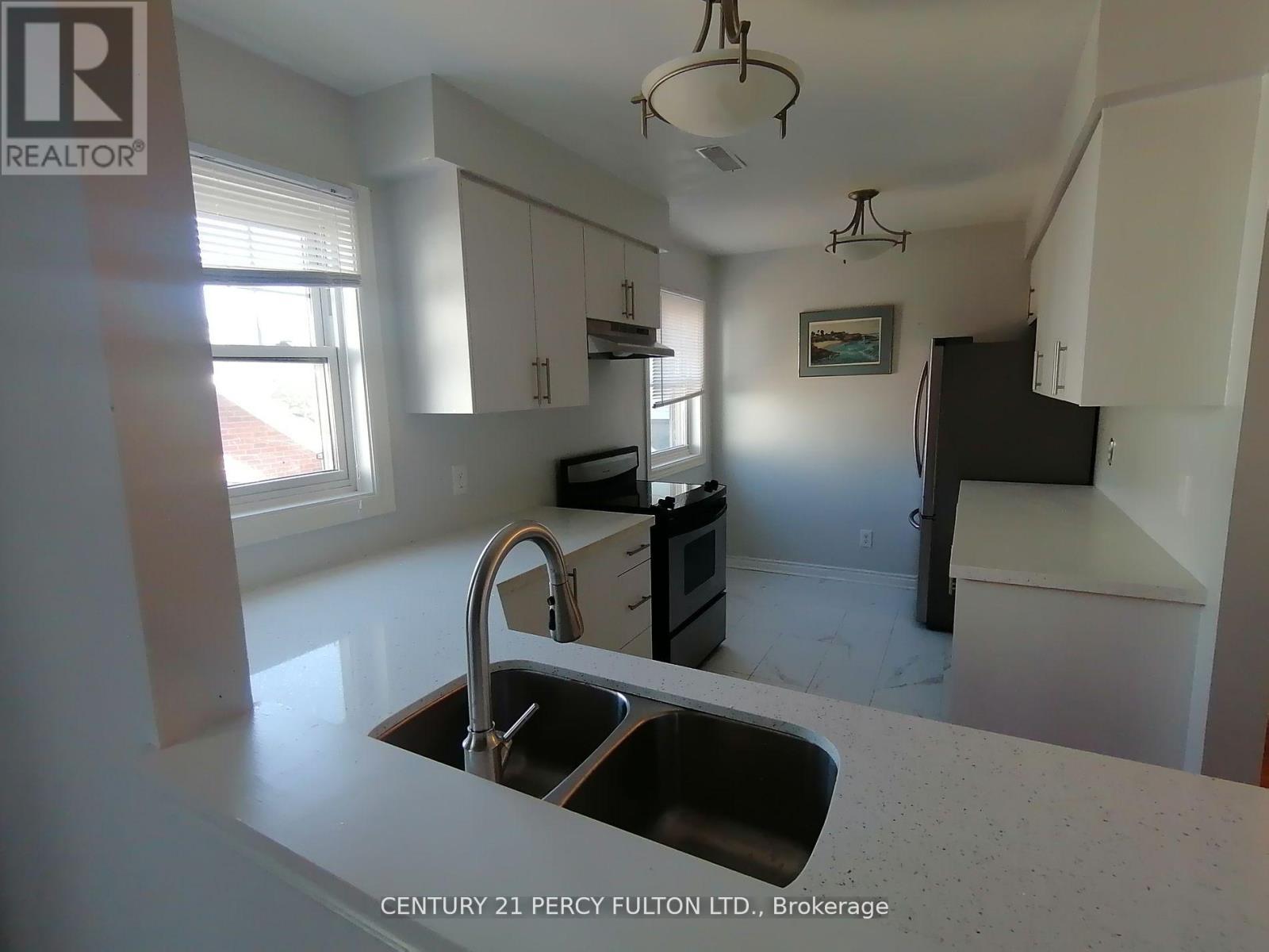 A11 - 1651 Nash Road, Clarington, ON - Indoor Photo Showing Kitchen With Double Sink