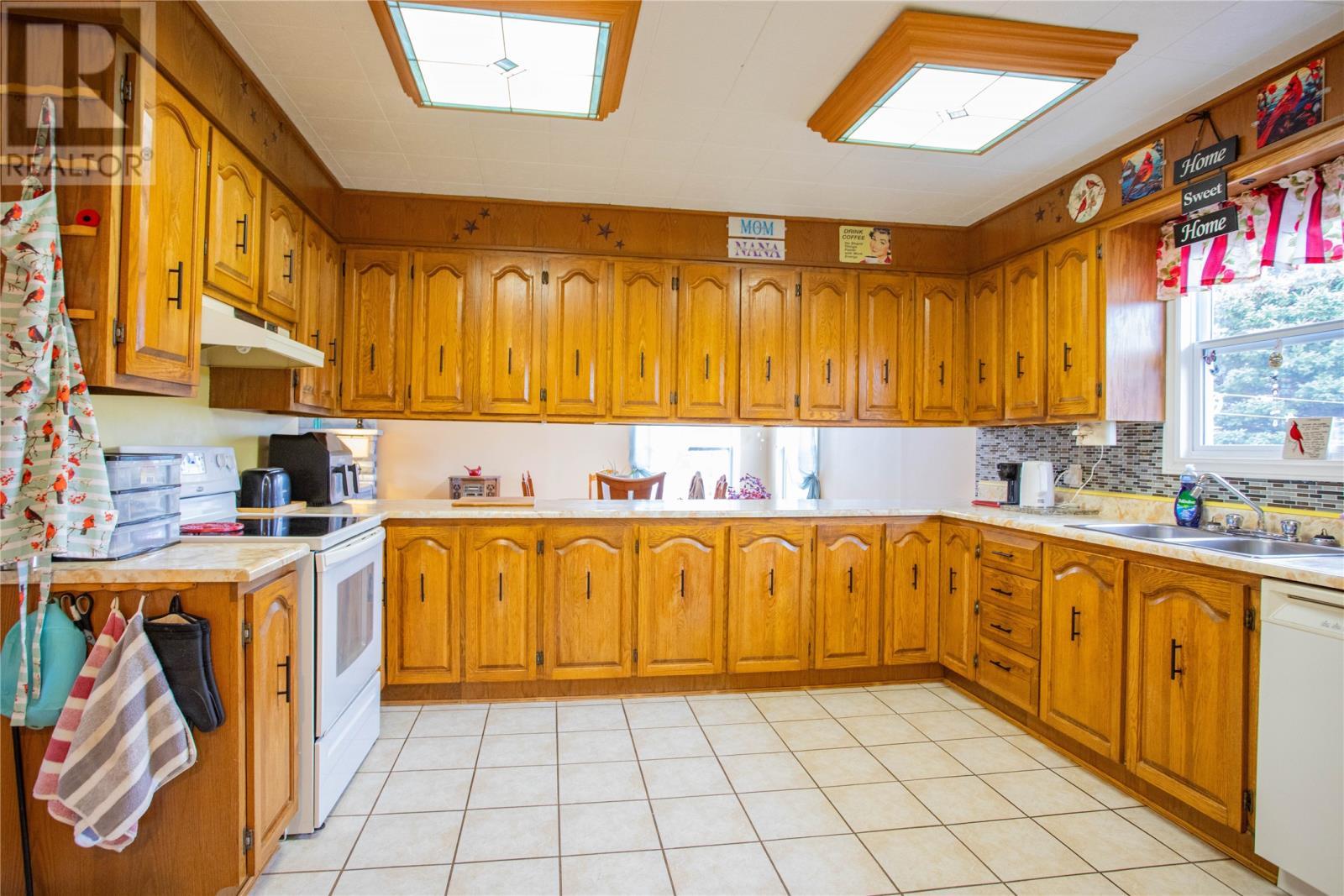9-11 Pondside Road, Spaniards Bay, NL - Indoor Photo Showing Kitchen With Double Sink