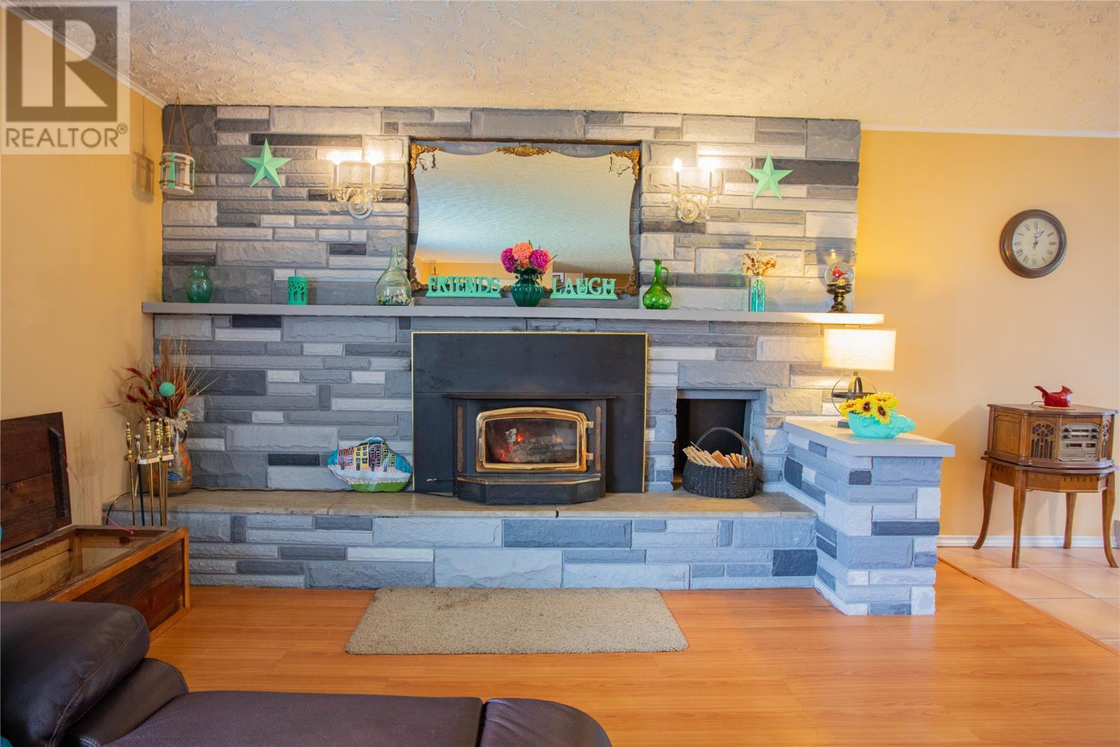 9-11 Pondside Road, Spaniards Bay, NL - Indoor Photo Showing Living Room With Fireplace