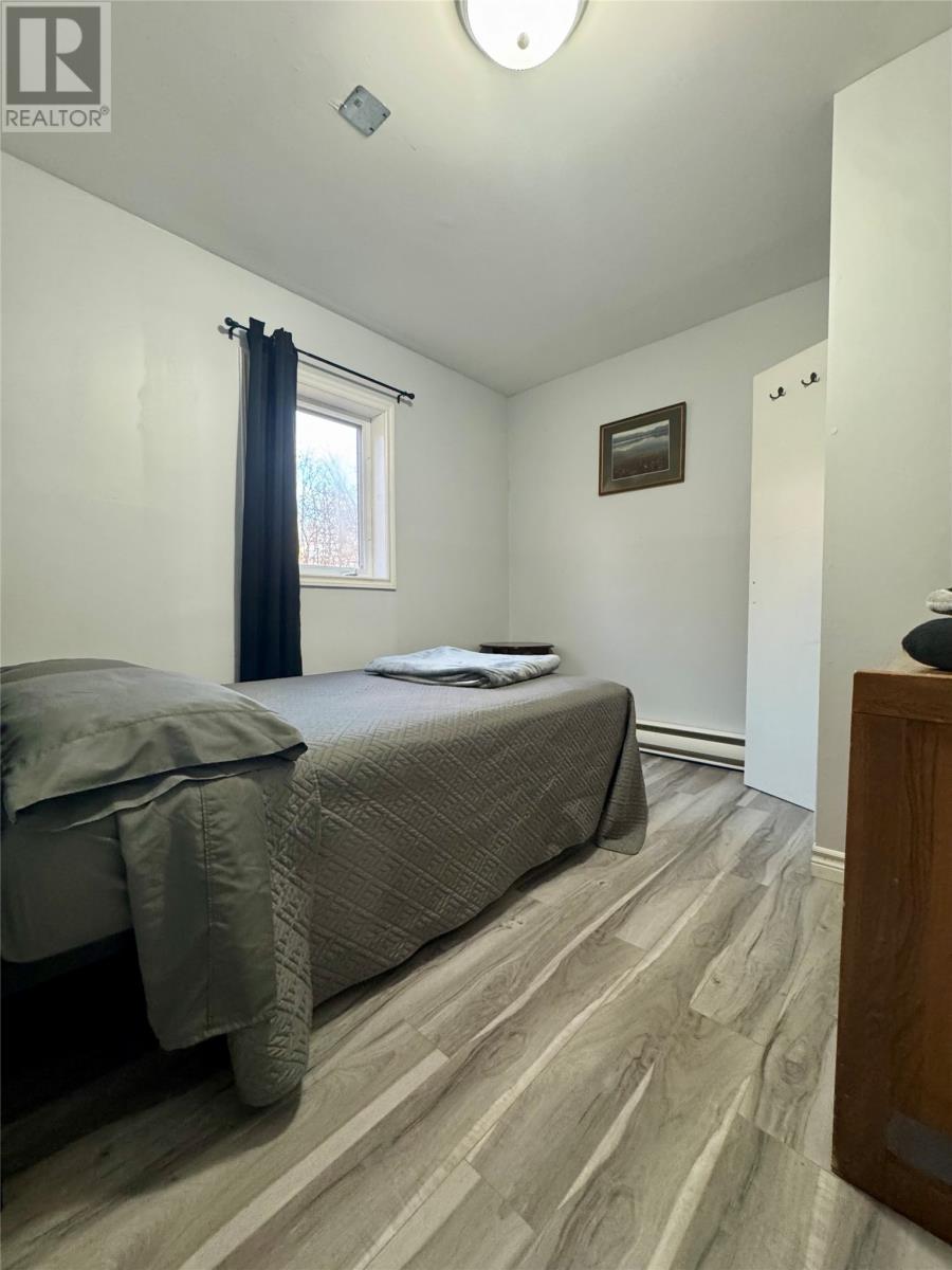 201-211 Main Street, Come By Chance, NL - Indoor Photo Showing Bedroom