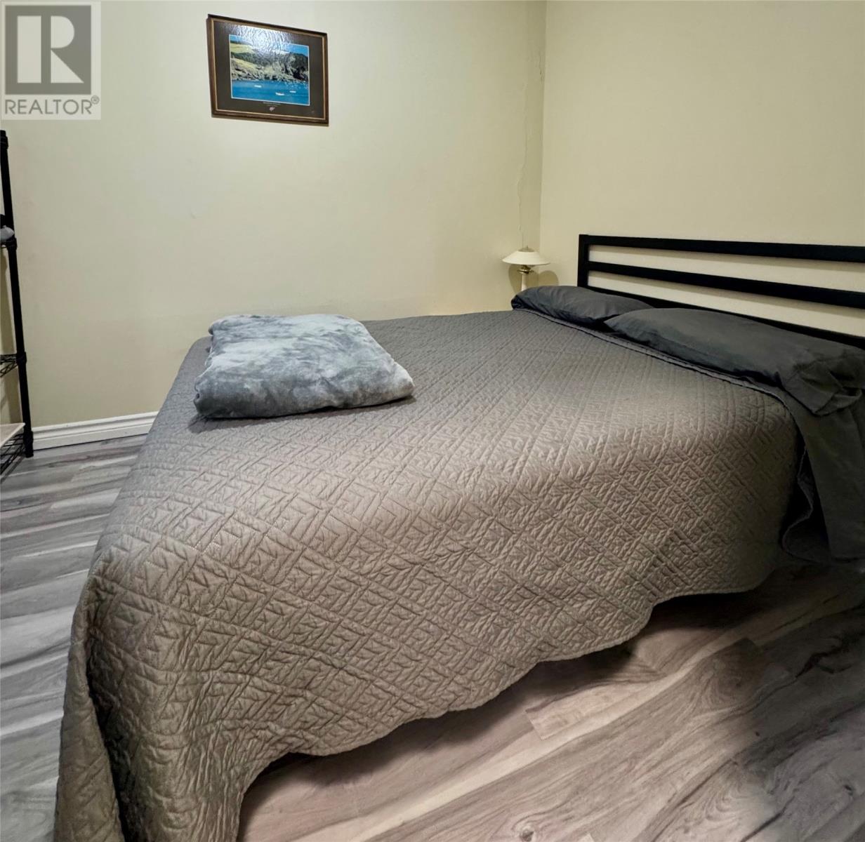 201-211 Main Street, Come By Chance, NL - Indoor Photo Showing Bedroom