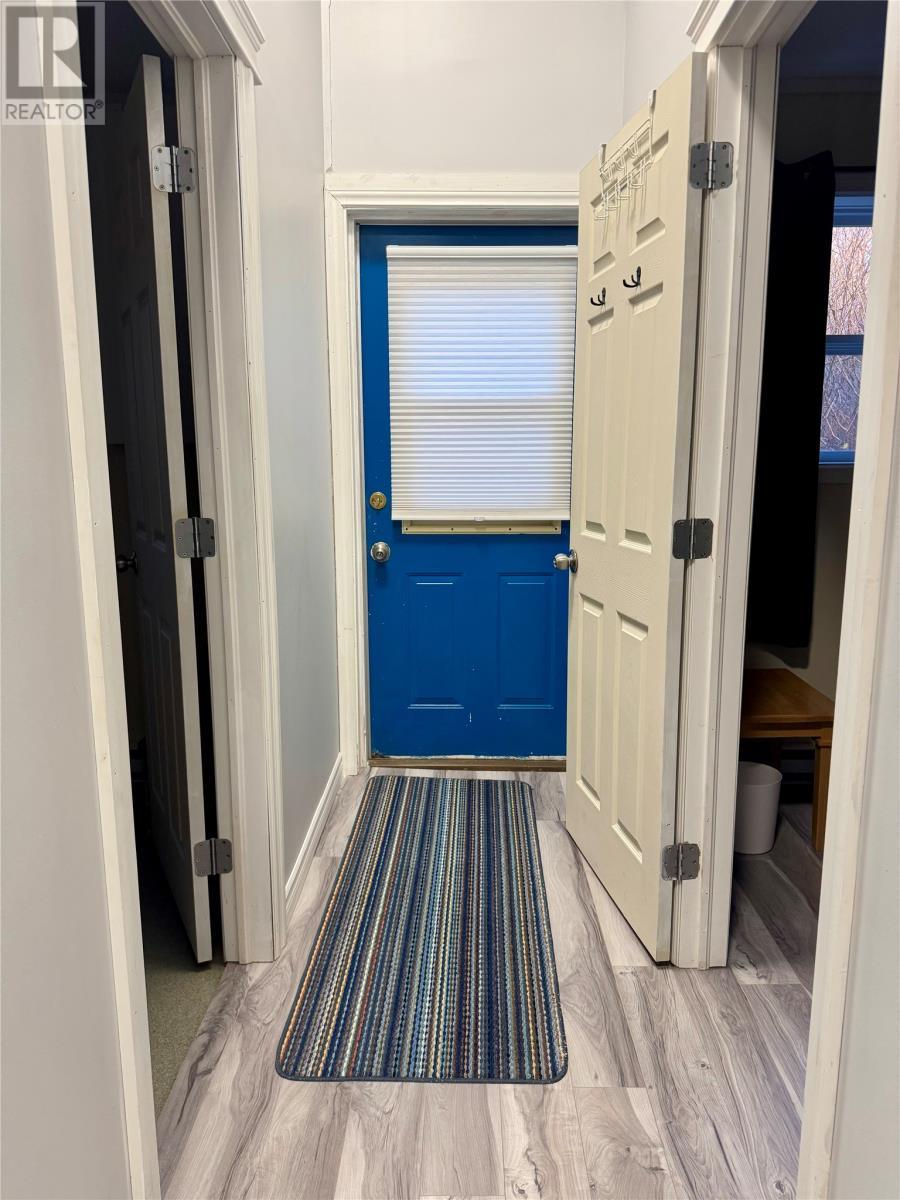 201-211 Main Street, Come By Chance, NL - Indoor Photo Showing Other Room