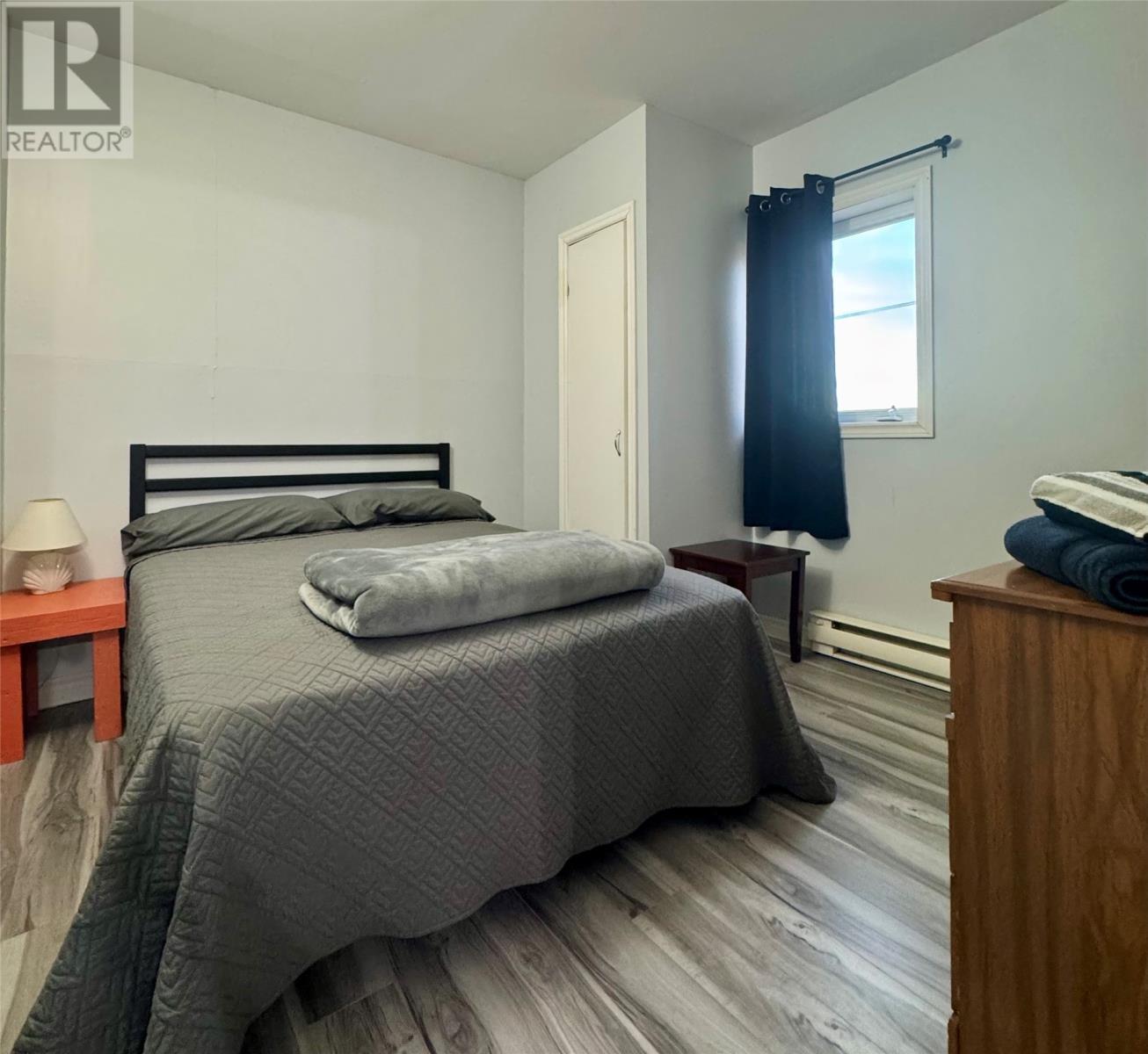 201-211 Main Street, Come By Chance, NL - Indoor Photo Showing Bedroom