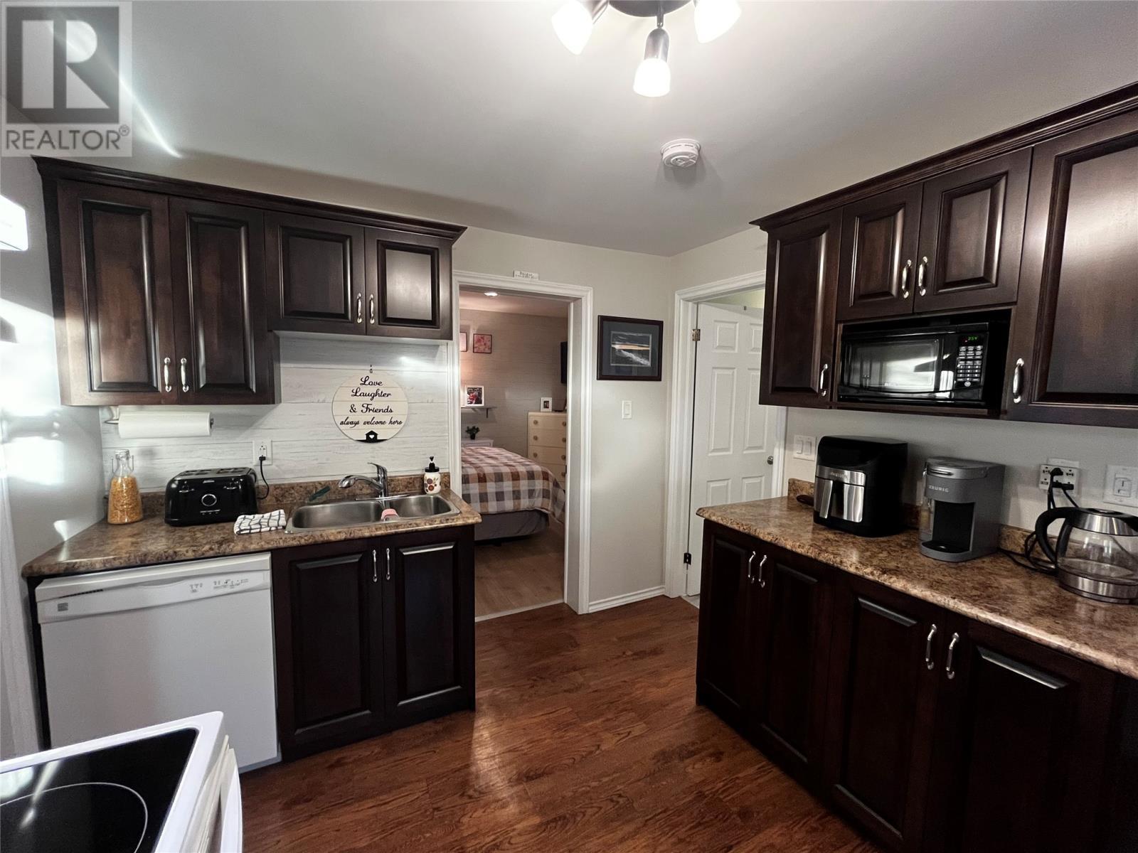 9 Chapel Lane, Brigus, NL - Indoor Photo Showing Kitchen With Double Sink