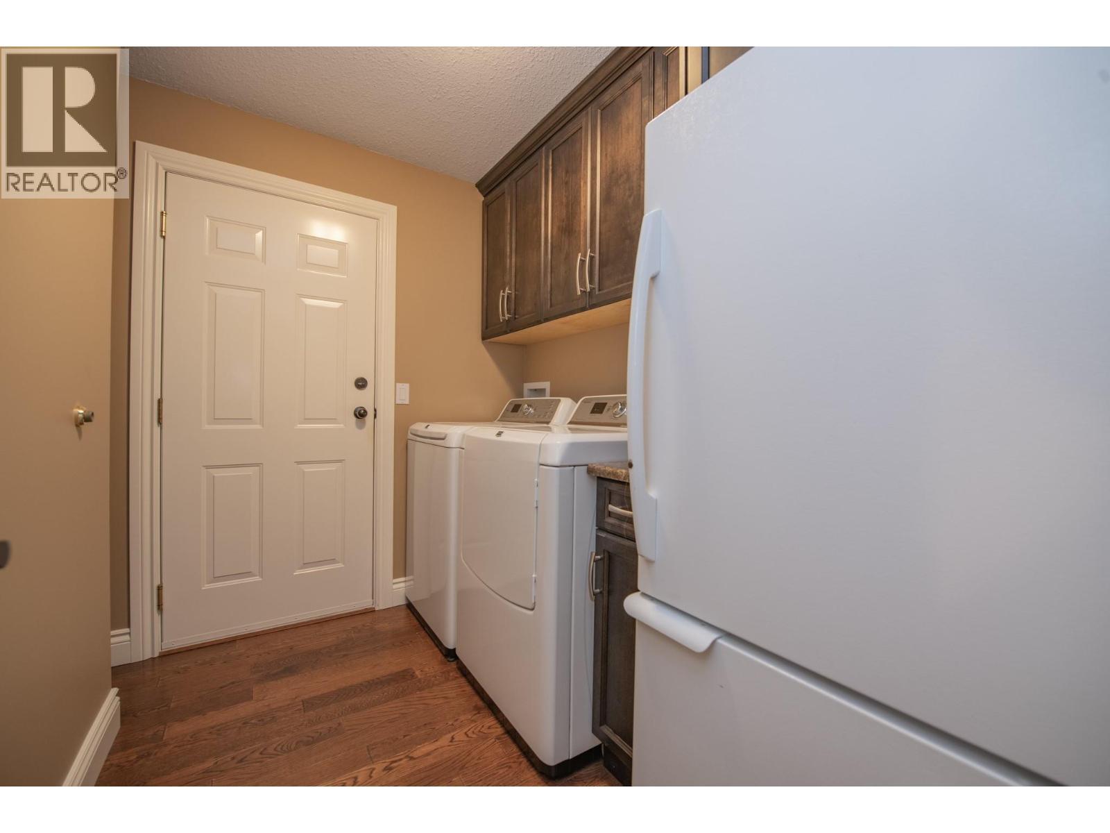 7903 Lakeview Drive, Coldstream, BC - Indoor Photo Showing Laundry Room