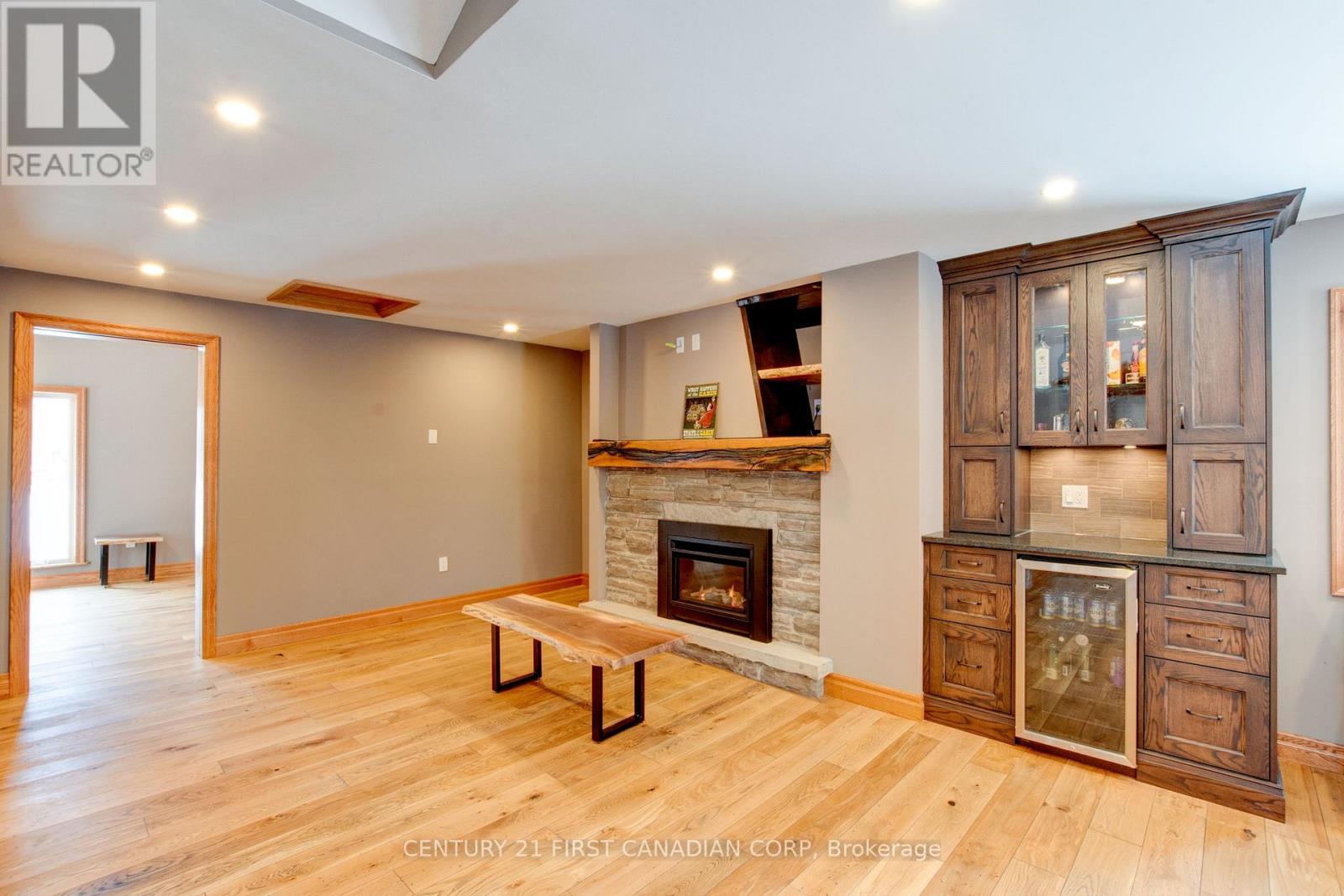 10771 Melrose Drive, Middlesex Centre, ON - Indoor Photo Showing Other Room With Fireplace