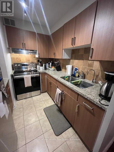 310 - 335 Lonsdale Road, Toronto, ON - Indoor Photo Showing Kitchen With Double Sink