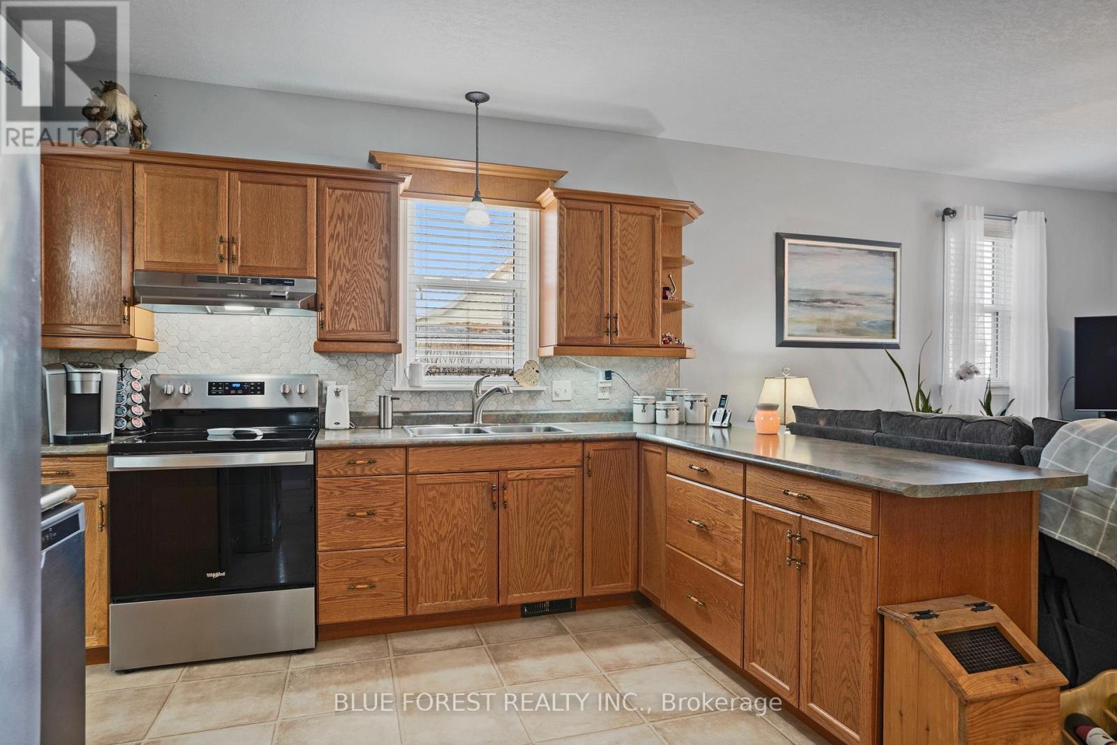 210 Jane Street, West Elgin (Rodney), ON - Indoor Photo Showing Kitchen With Double Sink