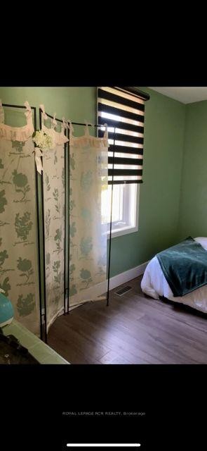 8320 Main Street E, Adjala-Tosorontio, ON - Indoor Photo Showing Bedroom