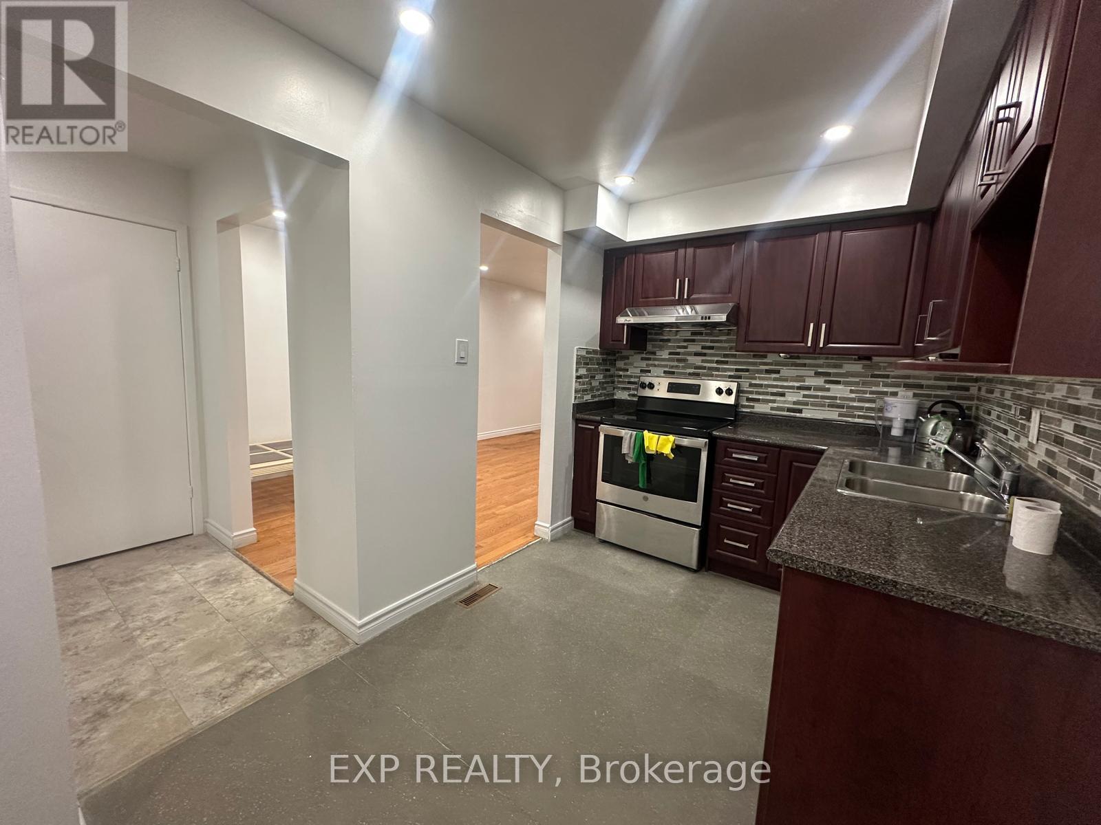102 Rakewood Crescent, Toronto, ON - Indoor Photo Showing Kitchen With Double Sink