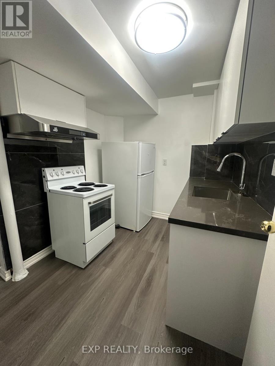 102 Rakewood Crescent, Toronto, ON - Indoor Photo Showing Kitchen
