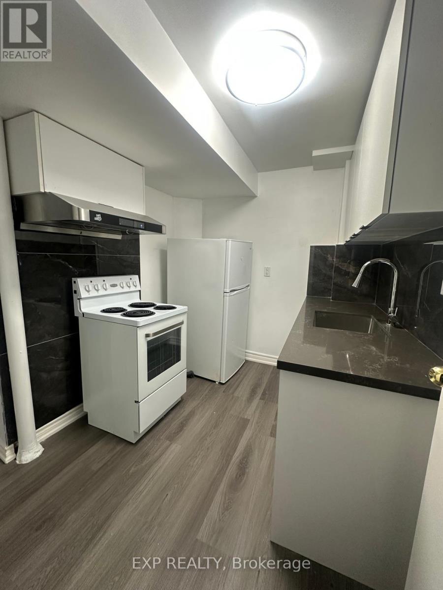 102 Rakewood Crescent, Toronto, ON - Indoor Photo Showing Kitchen