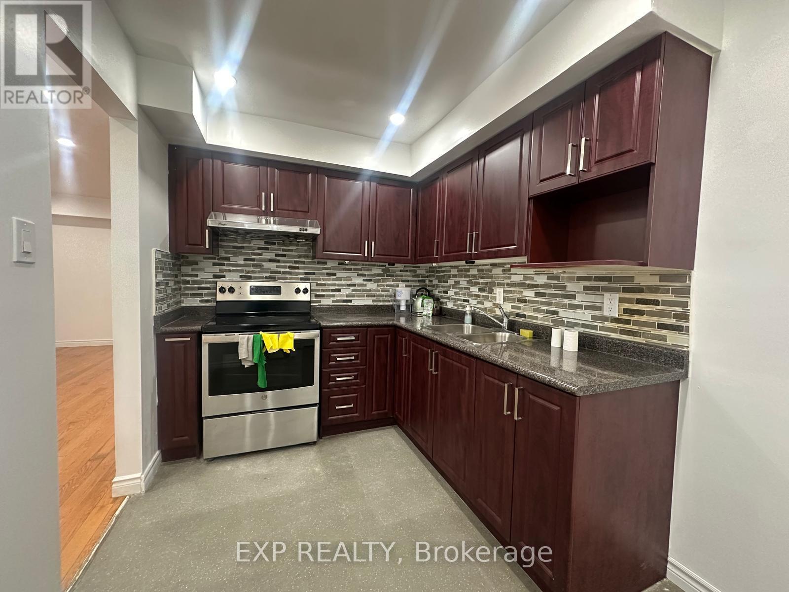 102 Rakewood Crescent, Toronto, ON - Indoor Photo Showing Kitchen With Double Sink