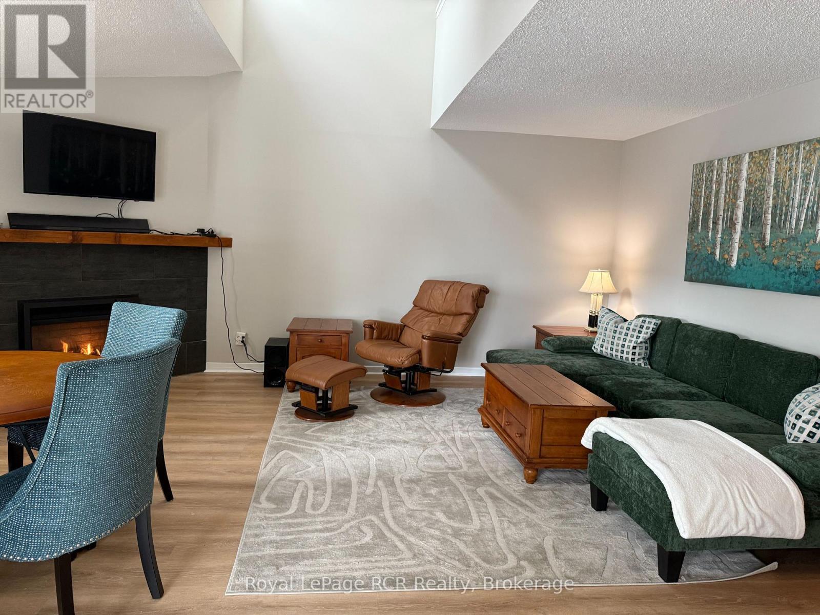 2 - 2 Trafalgar Road, Collingwood, ON - Indoor Photo Showing Living Room With Fireplace