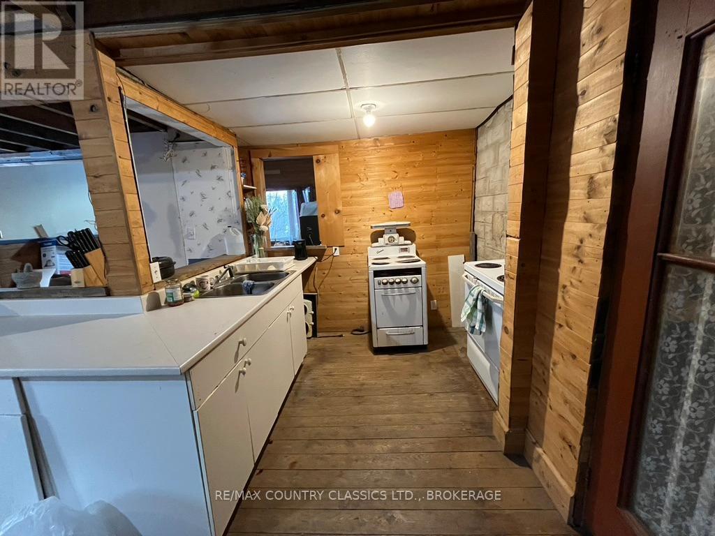 Open concept kitchen - 534 B Slate Falls Road, Addington Highlands (Addington Highlands), ON - Indoor Photo Showing Kitchen With Double Sink