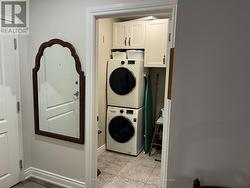 Laundry room off foyer -