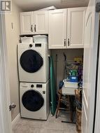 Stacking washer/dryer and storage -