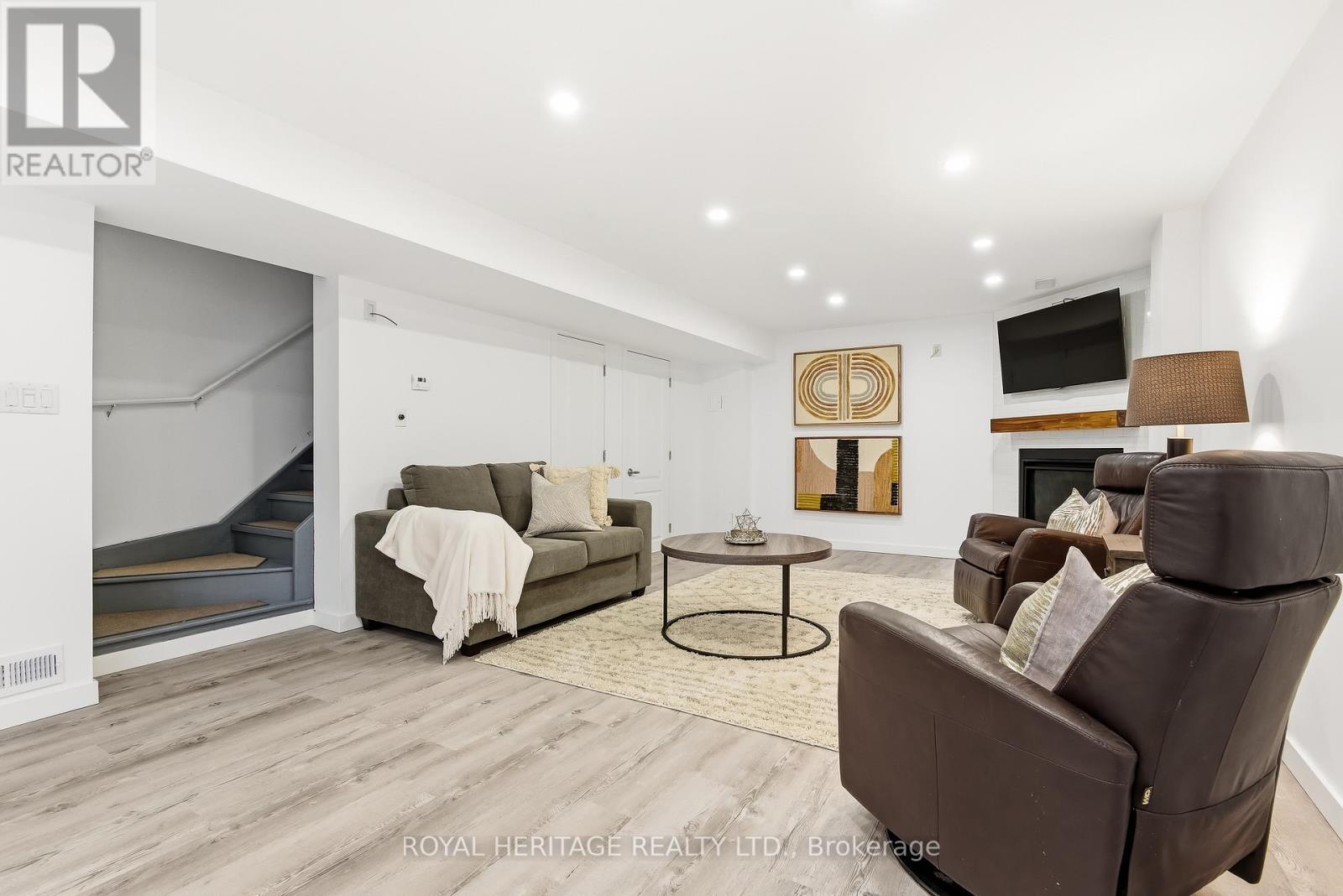 7 Sunderland Meadows Drive, Brock, ON - Indoor Photo Showing Other Room With Fireplace