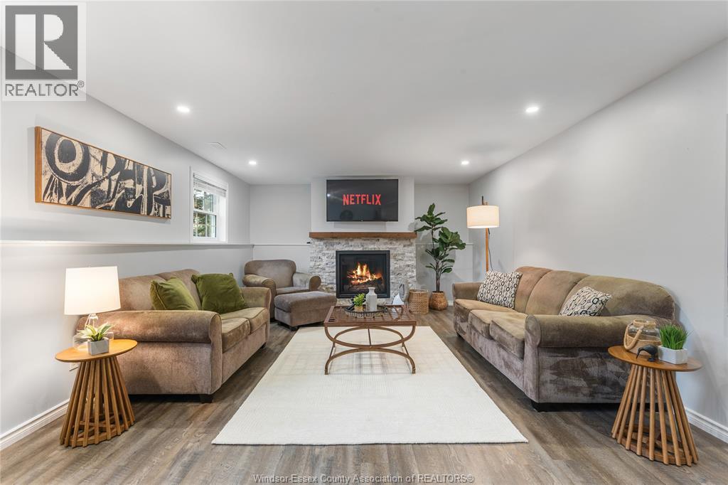 215 County Rd 34 West, Cottam, ON - Indoor Photo Showing Living Room With Fireplace