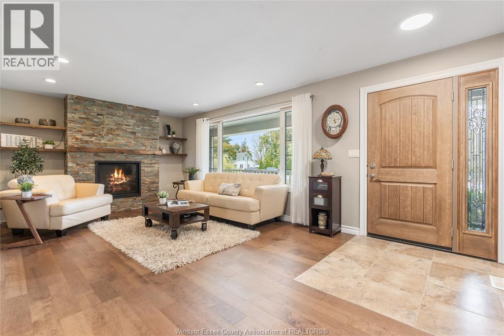 215 County Rd 34 West, Cottam, ON - Indoor Photo Showing Living Room With Fireplace