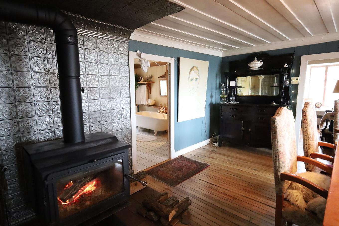 Dining room - 46 Route 132 E., Saint-Denis-De La Bouteillerie, QC - Indoor With Fireplace