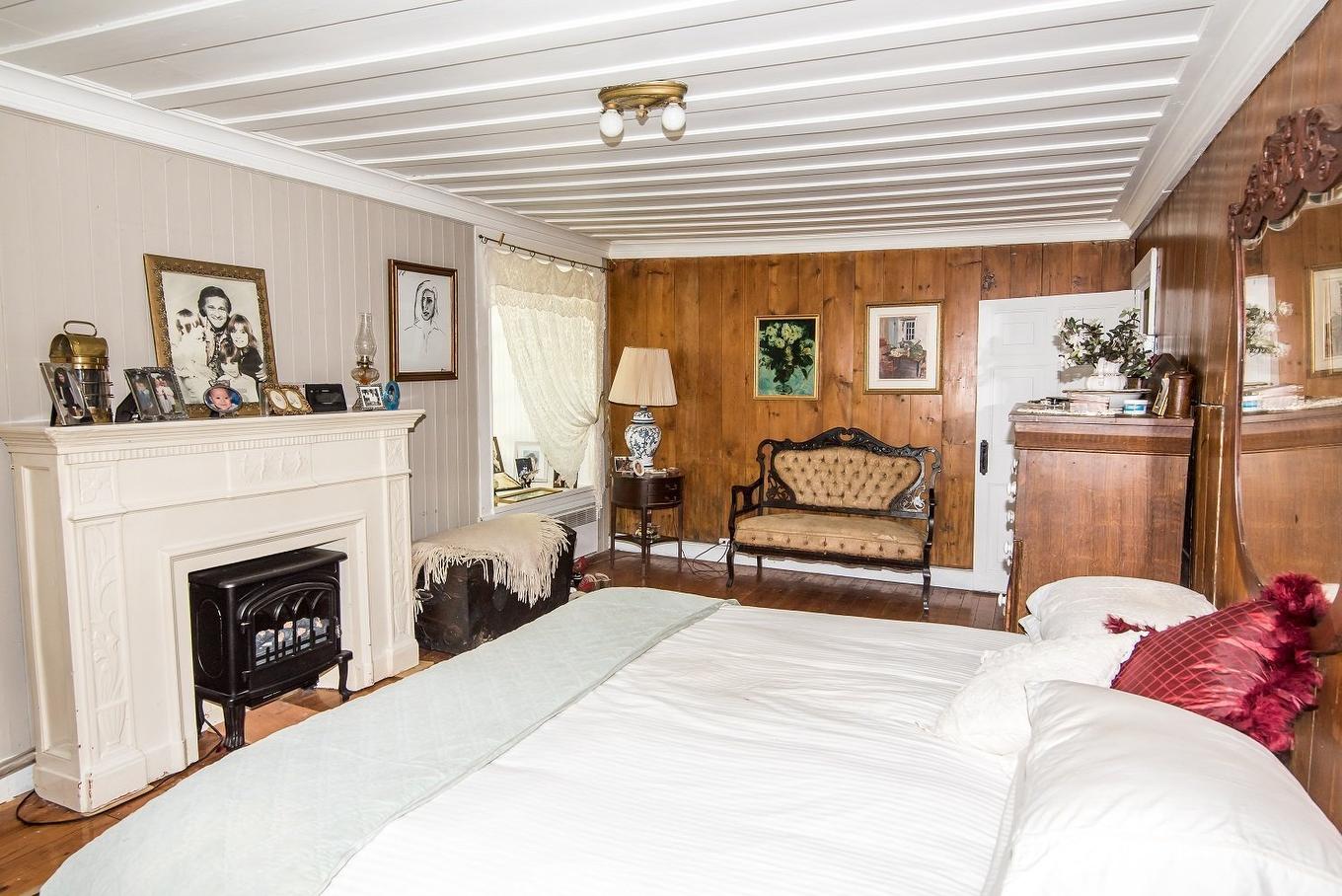 Primary bedroom - 46 Route 132 E., Saint-Denis-De La Bouteillerie, QC - Indoor Photo Showing Living Room With Fireplace