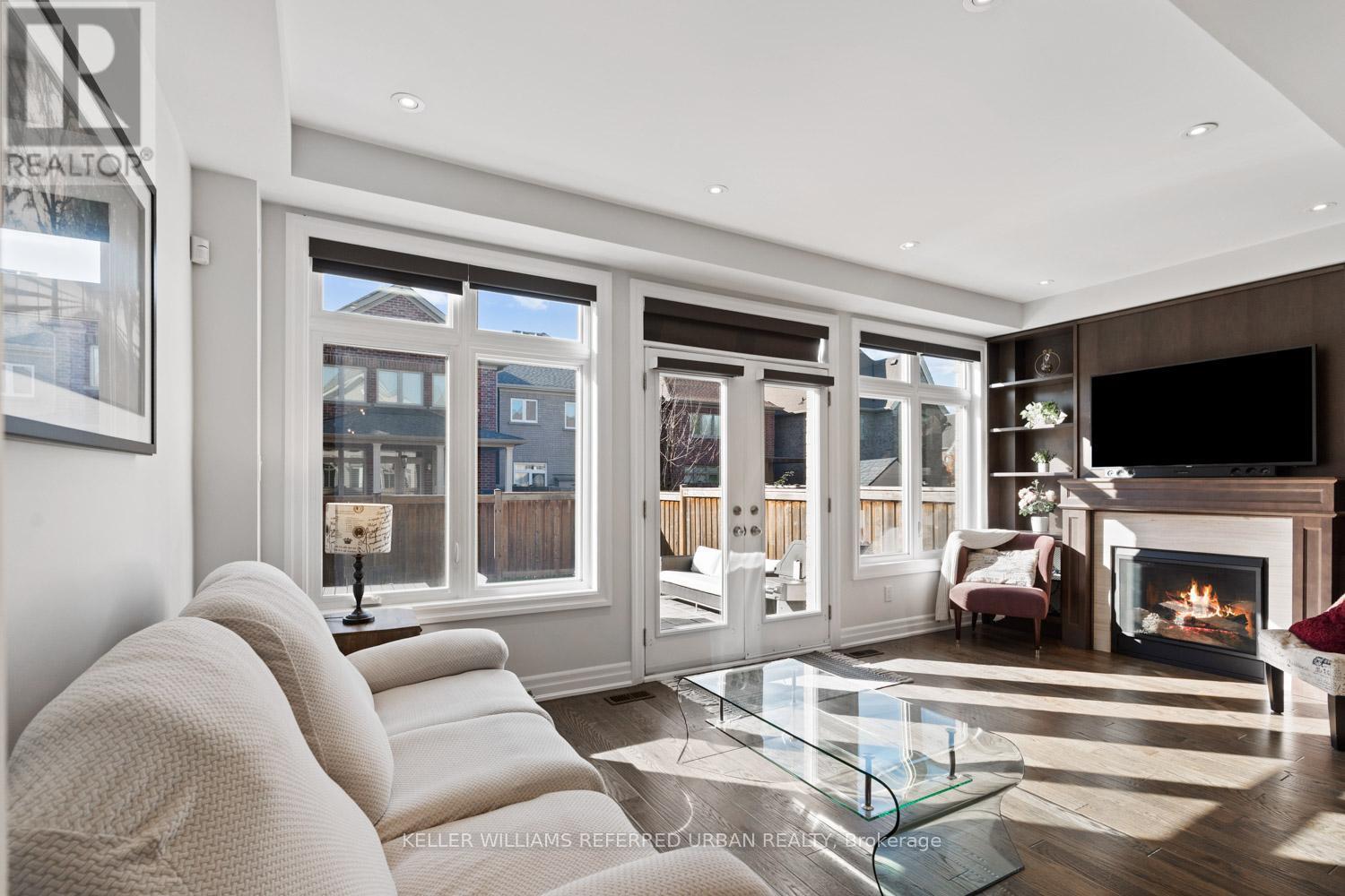 58 Wells Orchard Crescent, King, ON - Indoor Photo Showing Living Room With Fireplace