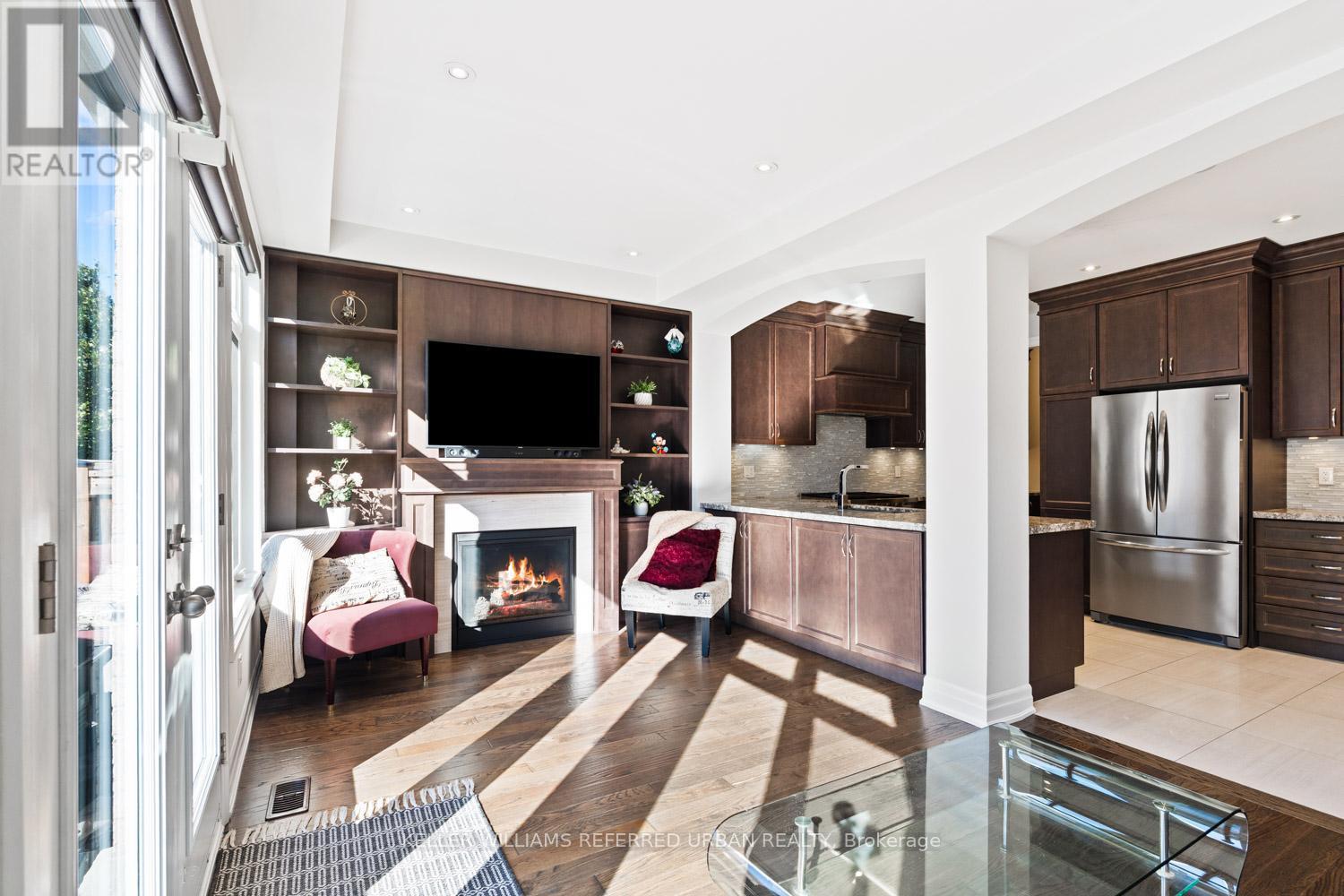 58 Wells Orchard Crescent, King, ON - Indoor Photo Showing Other Room With Fireplace