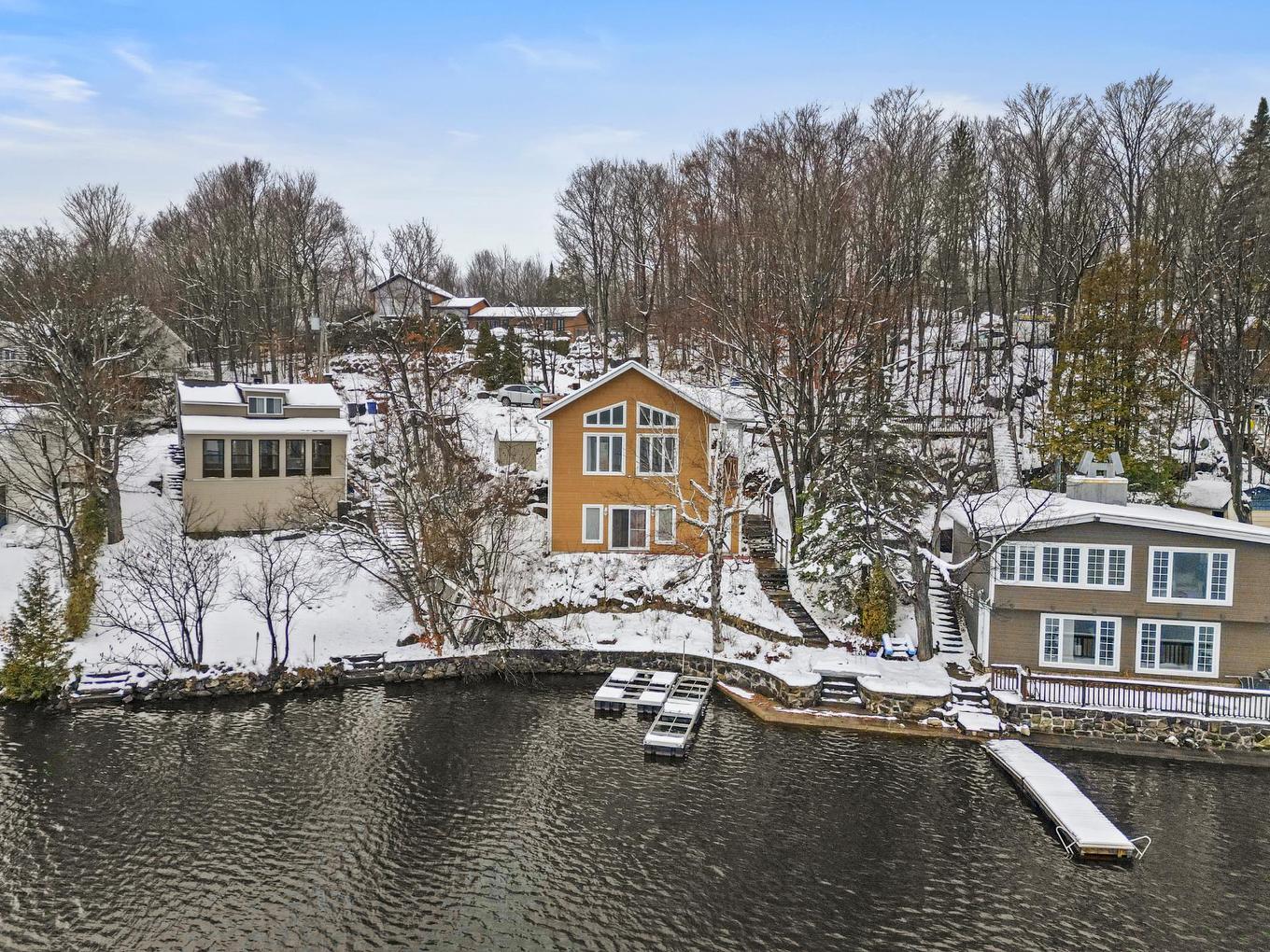 Façade - 700 Rue Du Cap, Saint-Hippolyte, QC - Outdoor With Body Of Water